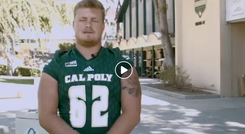 Man wearing a green Cal Poly football jersey with the number 62 standing outdoors near a building.