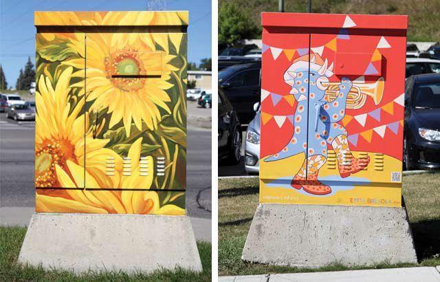 Sunflowers painted on one utility box; a cartoon blue dinosaur playing trumpet with bunting on another.