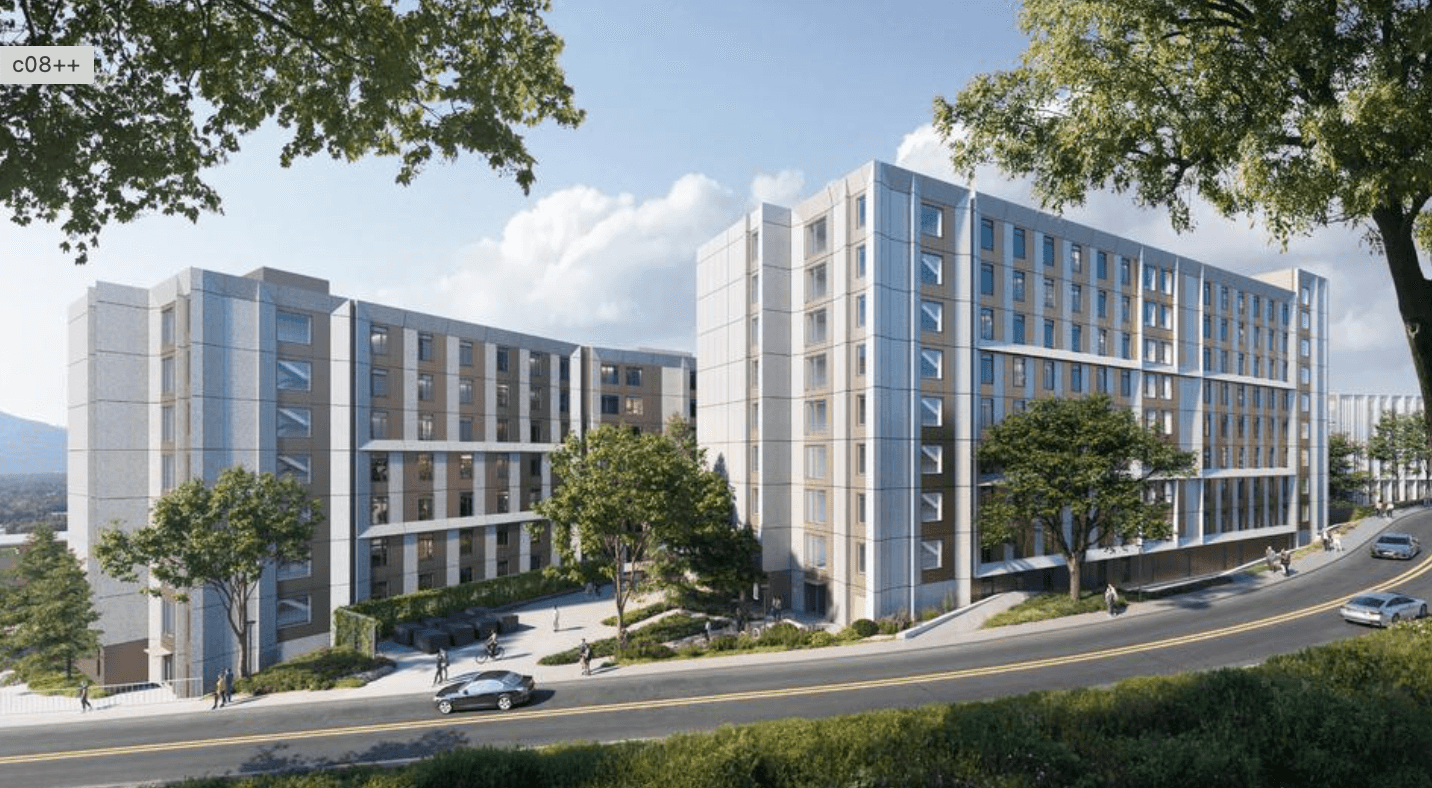 Modern multi-story residential buildings with trees and cars on a curved road in the foreground.