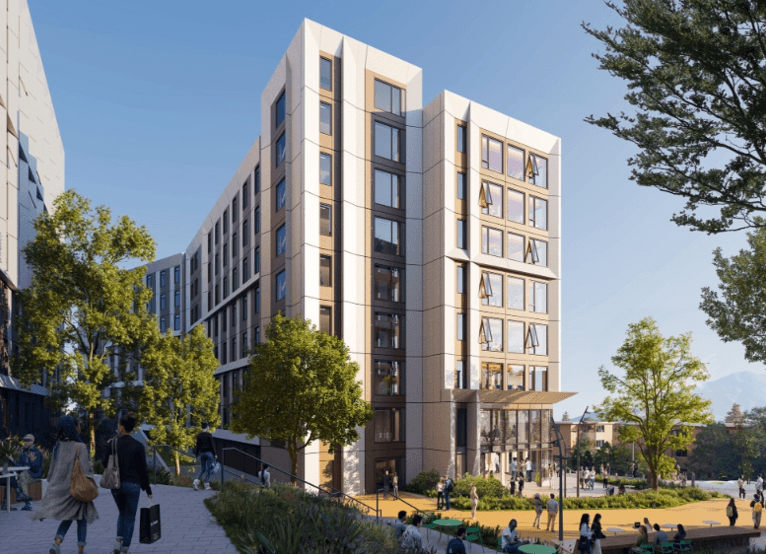 Modern multi-story building with large windows, surrounded by trees and people walking and sitting outdoors.
